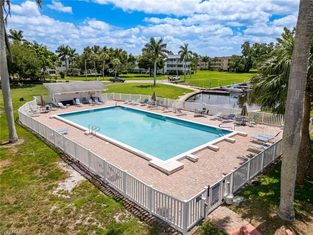 Huge Community Heated Pool overlooking Gulf Access Canal.