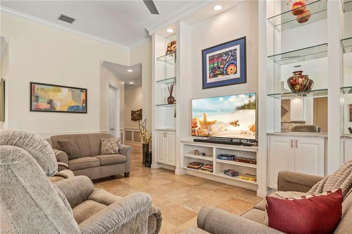 28353 Moray Dr Bonita Springs FL 34135 - 12 ft ceilings in the family room give an open spacious feel.