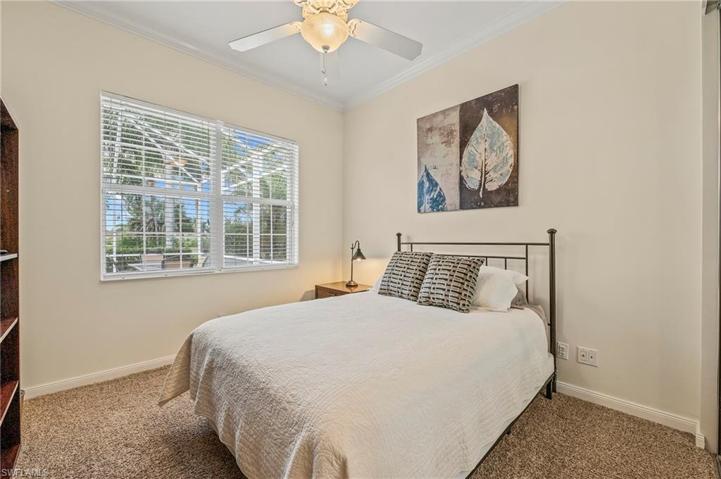 28353 Moray Dr Bonita Springs FL 34135 - bedroom 4 on the guest wing overlooks the pool and has a queen size bed