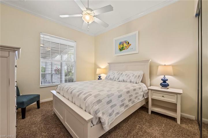 28353 Moray Dr Bonita Springs FL 34135 - Bedroom 3 has a queen size bed and large dresser