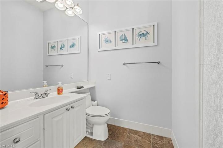 28353 Moray Dr Bonita Springs FL 34135 - Owner's bath with "rain" glass door to shower.
