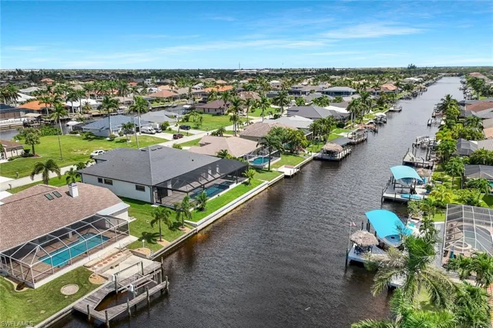 Aerial view of residential area with a large body of water