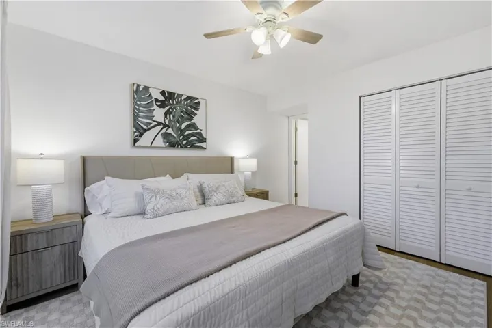 Bedroom with a closet and a ceiling fan
