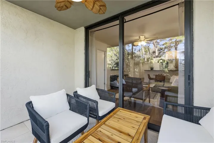 Patio featuring an outdoor living space and ceiling fan