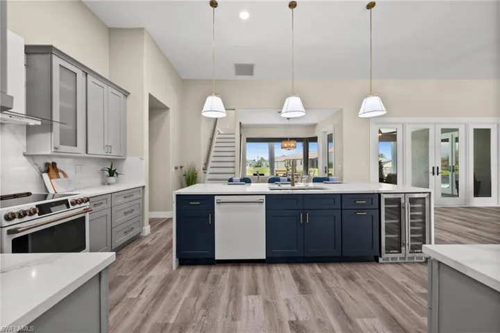 Huge Kitchen with Cafe appliances.