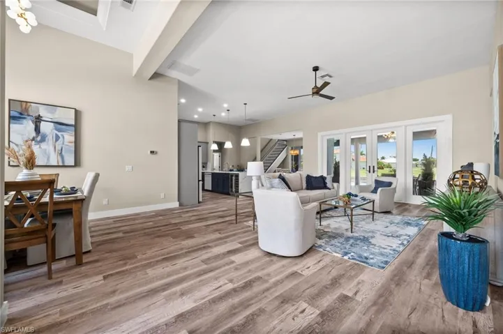 First look from the front door, tall ceilings and open concept living.