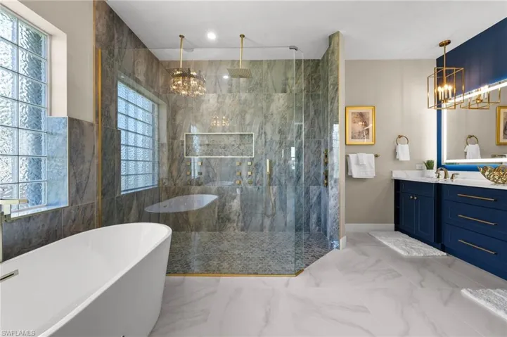 Primary Bathroom, vanity with dual sink, huge shower and seperate soaking tub