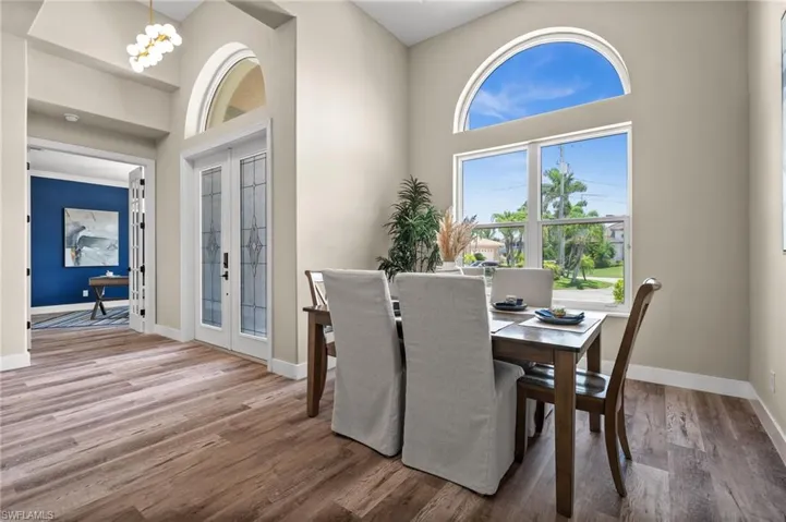 Front entry with view of dinning area and office/flex room/ bedroom