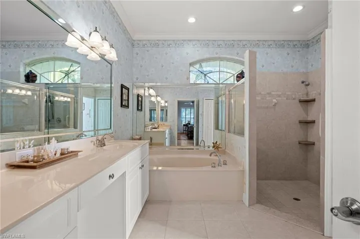 Primary bathroom with soaking tub and separate shower