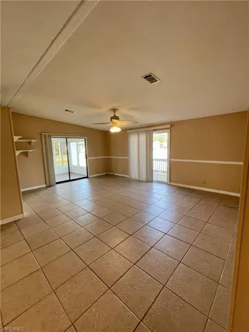 Living room with access to deck and Florida room