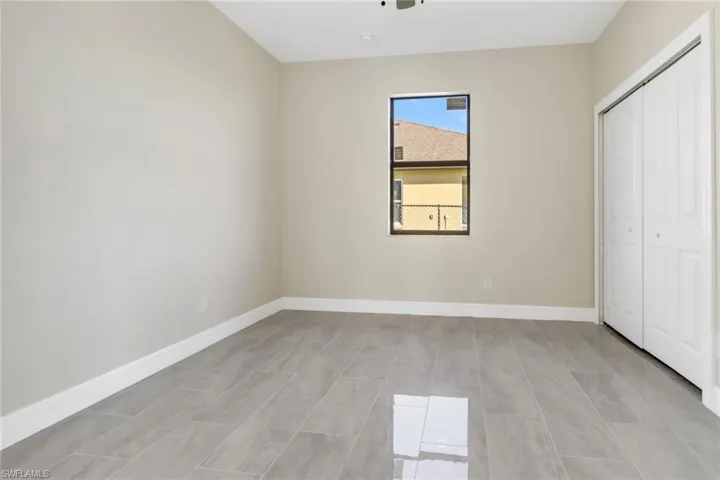 Unfurnished bedroom with a closet