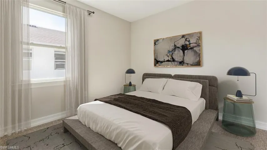 Bedroom featuring carpet