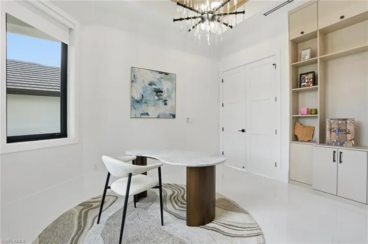 Office space with a chandelier