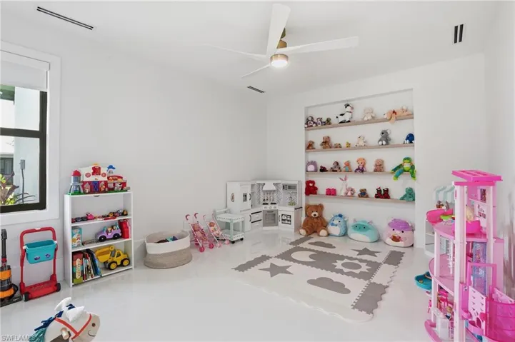 Game room featuring ceiling fan