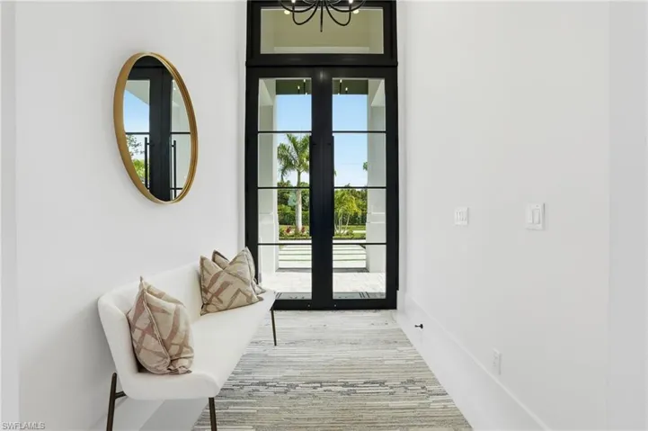 Entryway featuring a chandelier