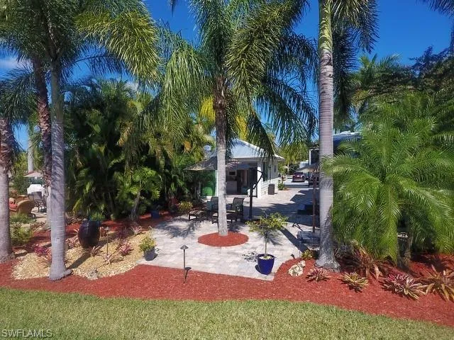 View of home's community with a patio area