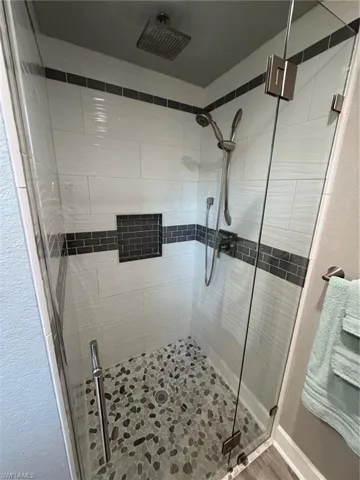 Bathroom with an enclosed shower