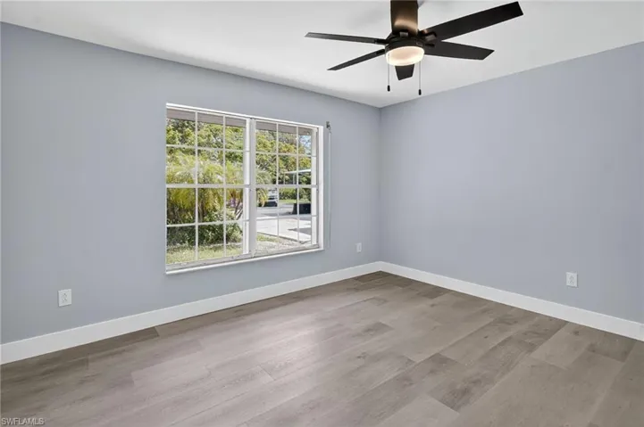 Guest bedroom featuring a ceiling fan