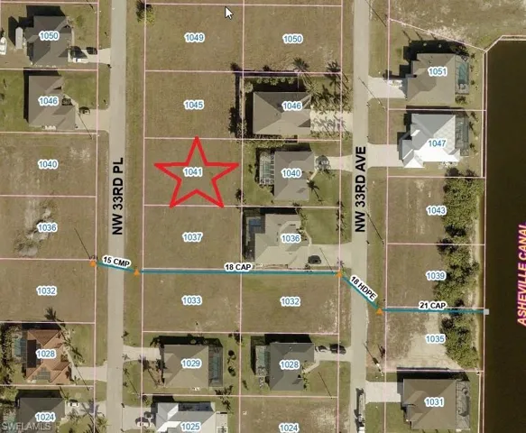 Aerial map of property and surrounding area featuring property boundaries highlighted
