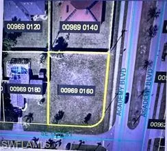 Aerial view of property's location featuring property parcel outlined