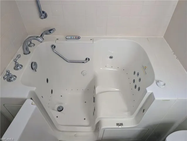 Bathroom view of a jetted tub