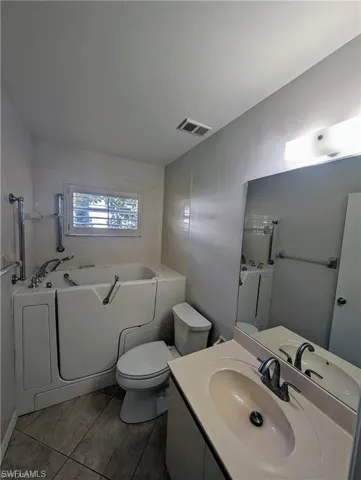 Bathroom features jetted tub