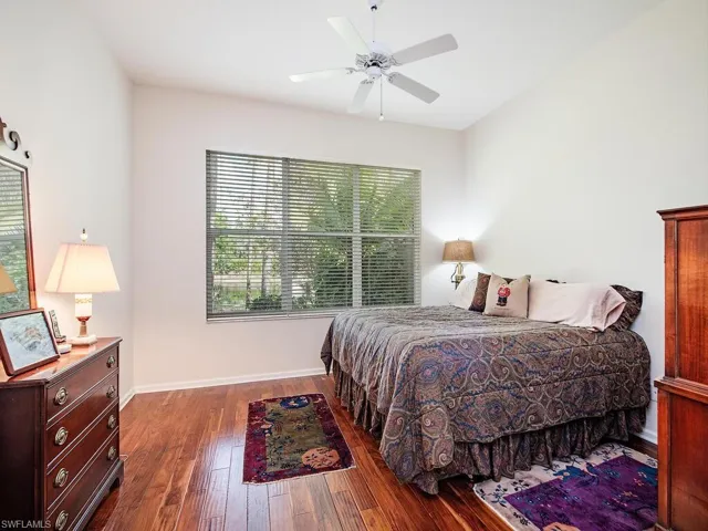 Large Master Suite with wood flooring and updated Master Bath