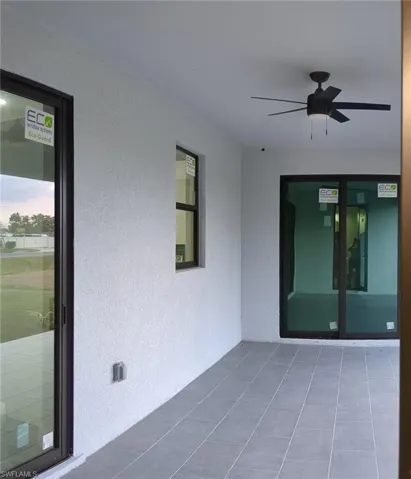 Patio terrace at dusk with ceiling fan