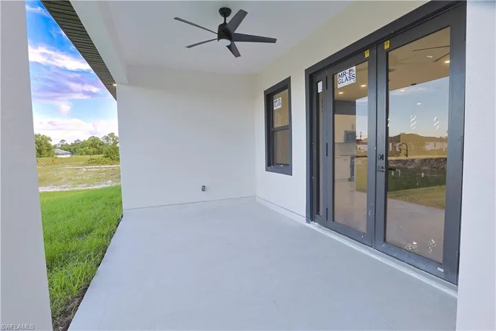 View of patio with a ceiling fan
