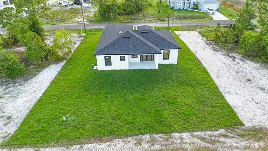 Aerial view of property and surrounding area