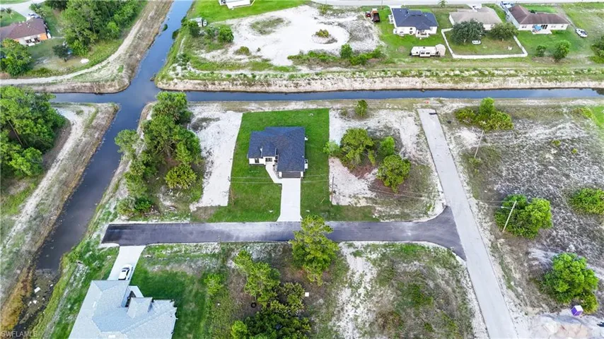View of property location with a large body of water