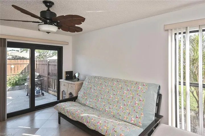 Guest Bedroom with Glass Door to Patio