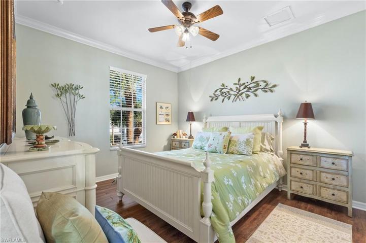 A spacious guest bedroom with a 8' x 5' walk-in closet