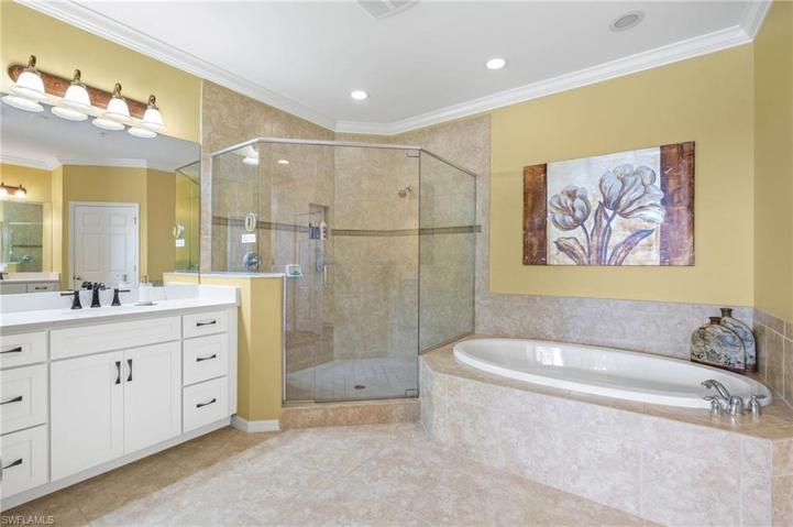 A huge stand-up shower & a separate soaking tub
