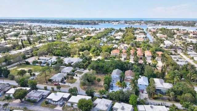Drone / aerial view with a water view of Royal Harbor