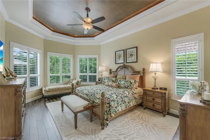 Spacious master retreat with tray ceiling indirect lighting, crown molding lounge area. Two walk in closets!