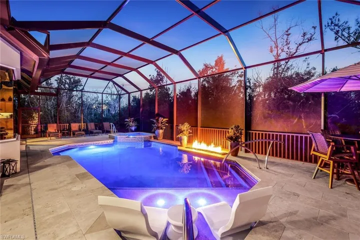 Relax and enjoy your resort style pool at dusk and pop on the relaxing fire feature.