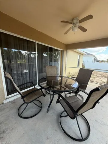 View of patio / terrace with ceiling fan and outdoor dining area