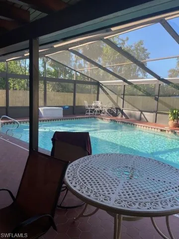 View of swimming pool with enclosure