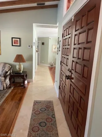 Corridor featuring light hardwood / wood-style flooring