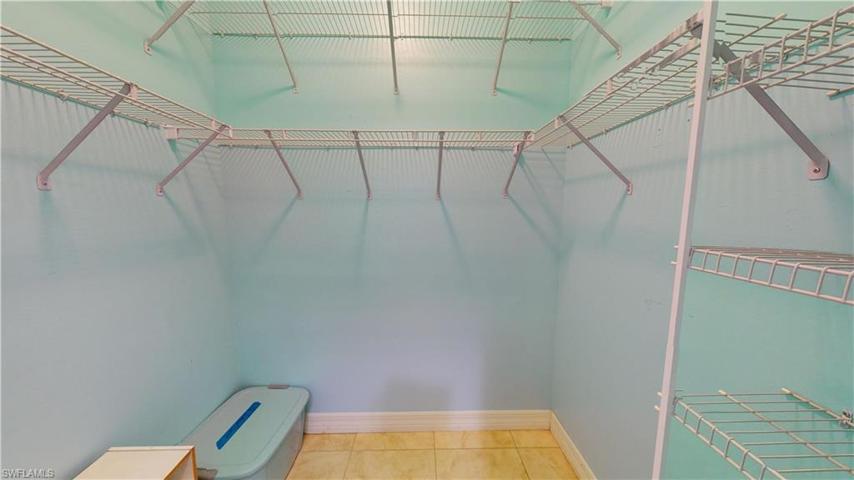 huge primary bedroom closet 1