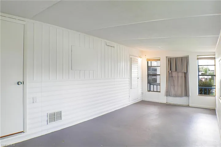 Spare room with concrete flooring