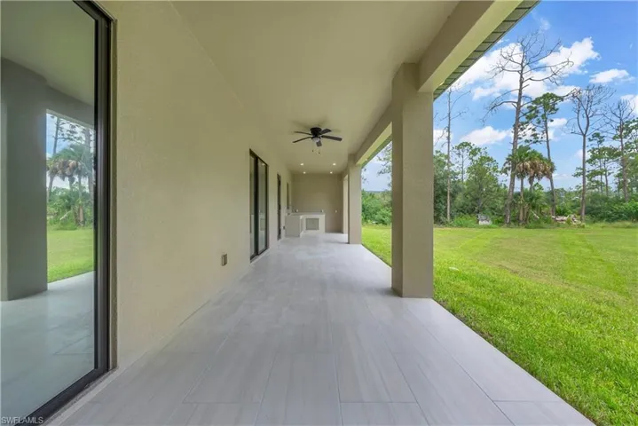 View of patio / terrace with a ceiling fan