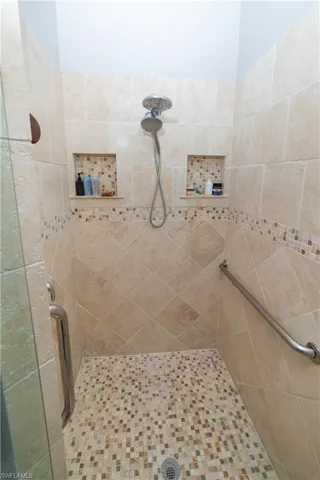 Bathroom with tiled shower