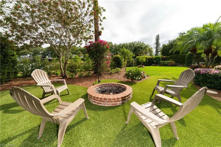 View of yard featuring a fire pit