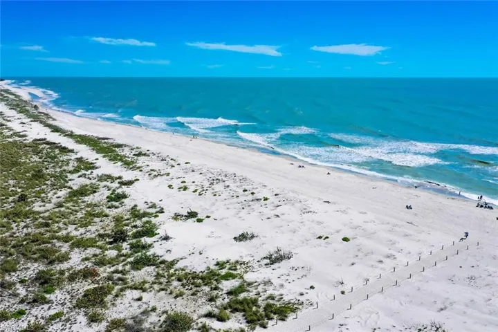 Property view of water featuring a beach view