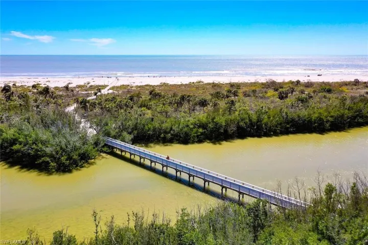 Property view of water featuring a beach view