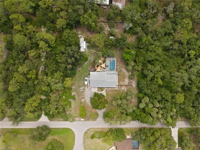drone shot of home and street