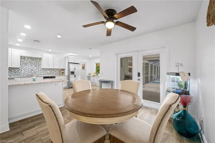Dining area featuring french doors out to Lanai