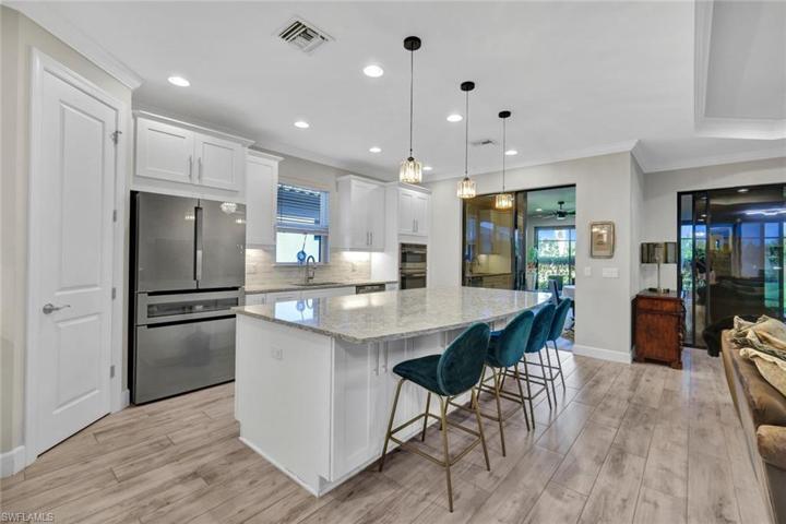 Welcome home to 11760 Canal Grande Dr Fort Myers